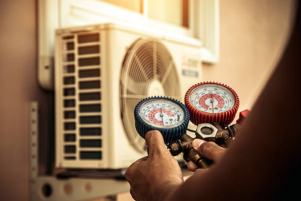Professional Hvac technician working in Wellsville, MO
